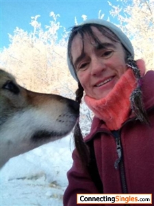 Me and my dog Sebastian, Taken in Bush Alaska, 12/28/11. It was an extremely cold, but beautiful day with highs of 40 below 0! (Yes, I am technically challenged look sideways, can you help fix it)