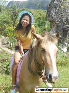 Me and April my parents horse it was taken during my holiday in philippines.dec.2013..i liked her very much..