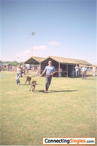 With my lady dog at an International Dog Contest, receiving the first prize.