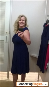 trying to take a pic without getting the face blocked is difficult...trying on this ralph lauren design....the fabric was so soft....fun to twirl around in....
