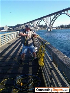 Crabbing off Newport Oregon pier last month.