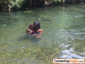 Little nephew and I enjoying a cool river bath in lovely Dominica