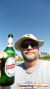 Chilling in the Cayman Islands with a cold Cay brew