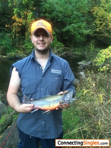 Caught a huge Brook trout in a tiny stream I am missing a sleave because i cut it off to make a stringer to keep the fish on