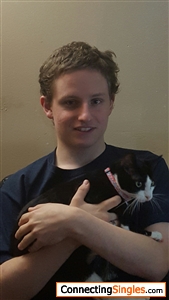 My son,22 years old with his cat Lilly 2015