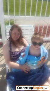 My 4 year old grandson and I at the pool