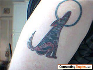 Coyote howling at a  blue moon .. Tattoo