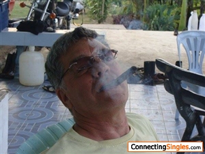A happy cuban cigar smoker.