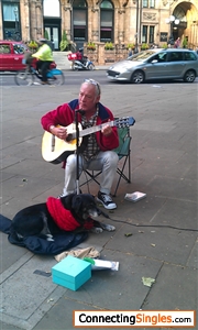 Busking, London. The dog just followed me.