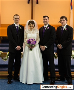 On the left,  2015 with my two brothers and my step mother