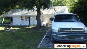 Photo taken June 21, 2018, That is my Canvas Wall Tent, and my 1998 Dodge Ram Truck. I am on 5 privately owned wooded acres, with walking trails, a fire pit, and laser lights pointed at the trees at n