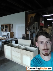 Me taking a selfie with a cabinet I just built.