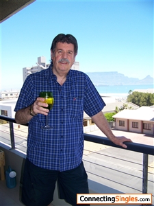 RELAXING AND ENJOYING THE VIEWS ON MY DAUGHTER`S STOEP ON THE BEACHFRONT IN TABLE VIEW .