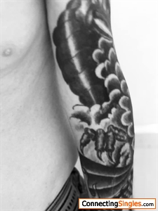 I’ve got a full sleeve gothic dragon tattoo