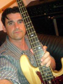 A bass  player  that has grounding