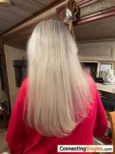 This is Feb. of 2023 but I had it cut straight and now it is a little longer but it's all straight rather than so lopsided....