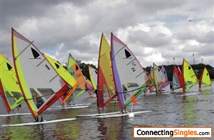 Yes! that's me, 4th from the left, on the blue board, green & orange sail. Its a NSW state titles Windsurfing race, I came 3rd in the mens, beating all young ones on old equipment & torn sail! YIPPEE