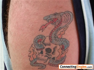 this is my first tat cobra in a skull