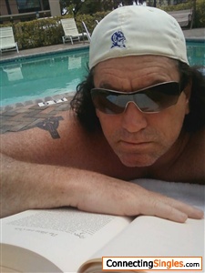 perfect day..reading at the pool..
