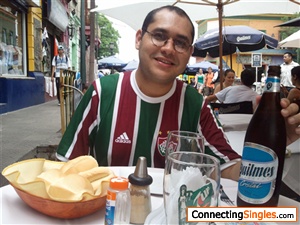This is a photo of my travel to Argentina. In this, I was having lunch at the neighborhood of Caminito, were is situated the football team Boca Junior ( but MY TEAM is FLUMINENSE!!!!)