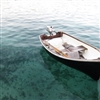Clear water and a boat Puzzle