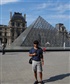 In front of the Louvre Museum in Paris France My third stop during my European vacation 2013