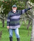 Adam in apple orchard in New Zealand