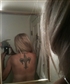 Fleur de lys tattooed on my back I wear it proudly
