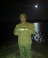 20 inch Brown Trout caught on swimbait cast far into the ripples of the reflection of the full moon at Grantsville Reservoir