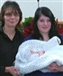 This is my daughter and me at my granddaughters baptism