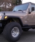 My Jeep Wrangler with 4 inch lift and 33 inch Falkin Tires new Rock Crawler front bumper added since this photo was taked