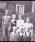 Our family in 1956 in front of our house which was built in 1850 I am standing in front of my sister I am 7 years old