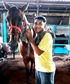 Take a pose with my most favorite horse after his daily exercise at the racetrack