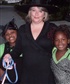 these are my girls 8 year old Marion and 6 year old Nanase on Halloween 2010 taking a picture with some random lady in witch
